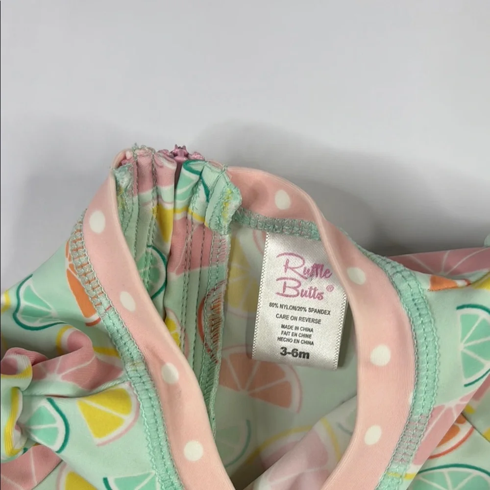 Ruffle Butts Baby Girls Squeeze The Day Pink and Green Citrus One Piece Swimsuit